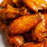 Delicious air fryer buffalo wings served with dipping sauce