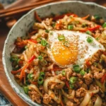 Delicious Chicken Egg Roll in a Bowl featuring fresh vegetables and savory chicken