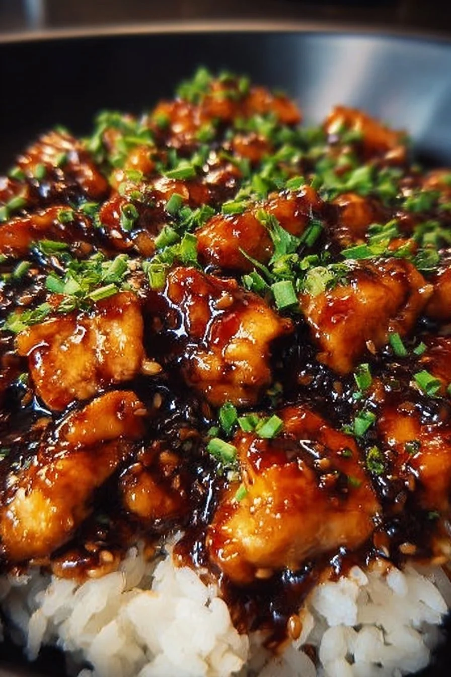 Honey BBQ Chicken over Rice 2 Honey BBQ Chicken served on a bed of rice with fresh garnishes